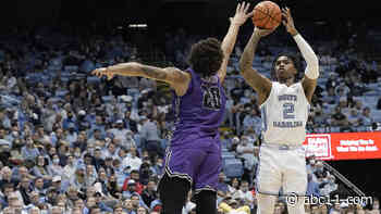 Dawson, Bacot help UNC get past Furman 74-61