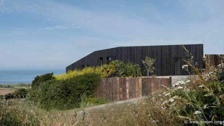 Studio Fuse designs charred-timber home in Devon to be both rustic and modern