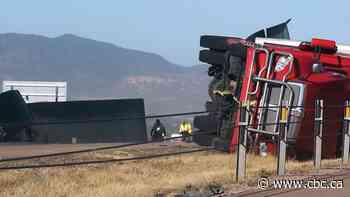 Strong winds tear through U.S. Midwest, toppling semi trailers, blowing up dust