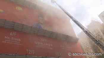 WATCH:  Fire briefly traps scores of people in Hong Kong skyscraper