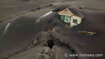 Volcano spewing lava over Canary Island of La Palma goes quiet