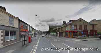 Biker taken to hospital following crash with car in Darwen