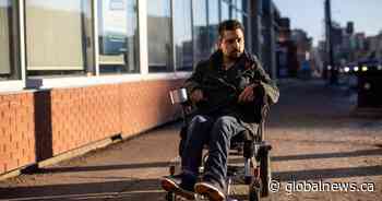 Man in wheelchair making Edmonton accessible one bar at a time - Global News