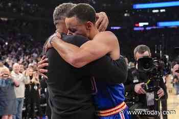 Watch Steph Curry and his dad share an emotional hug after he breaks 3-point record