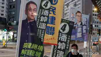 Hong Kongers vote in 1st election since security-law crackdown, but opposition is calling for boycott