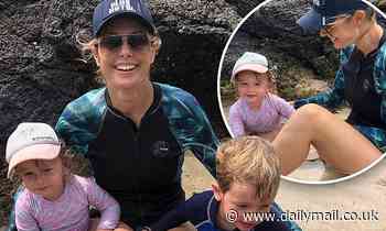 Today host Allison Langdon is every inch the doting mother as she enjoys a fun day at the beach - Daily Mail