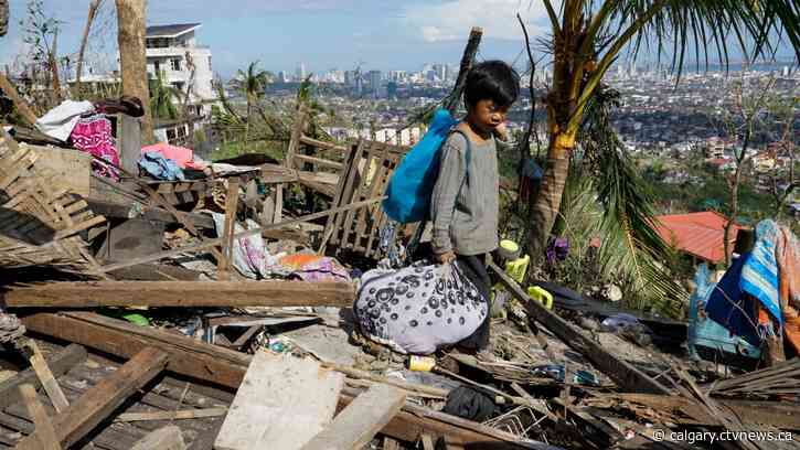 'Just looking for answers': Families try to connect with loved ones in the Philippines after typhoon