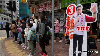 Pro-Beijing candidates sweep victories at Hong Kong polls amid record low turnout