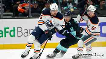 Dozens of NHL, NBA games postponed as COVID-19 cases rise