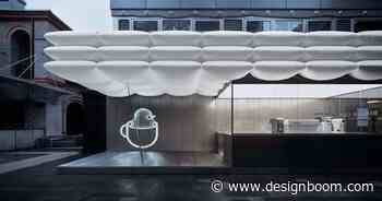 FOG architecture's birdie cup coffee nested beneath floating white puffs - Designboom