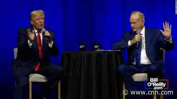 Trump's Covid-19 booster admission met with boos from crowd