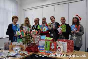 Staff and students pen Christmas cards to elderly residents in care homes