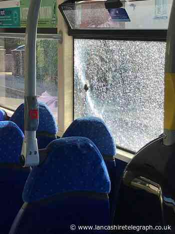 Burnley youths smash bus window with rocks
