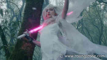 Grimes Duels a Dark King With Chess Pieces, Lightsabers in ‘Player of Games’ Video