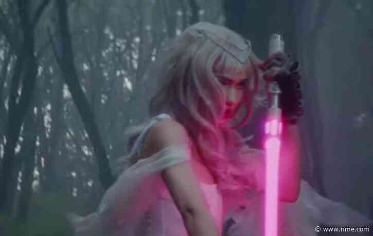 Watch Grimes’ lightsaber-wielding video for ‘Player Of Games’