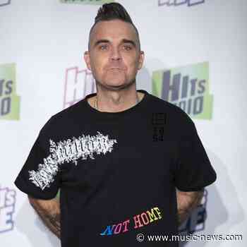 Robbie Williams and Guy Chambers are working on a new musical