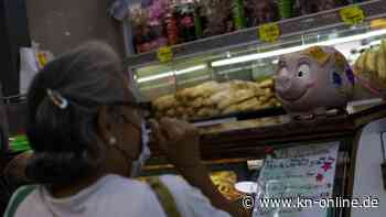 „Weihnachtsschweinchen“ für Trinkgeld in Venezuela bunt dekoriert