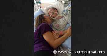 Tearful Mom Shares Story About Son's Death After Photo of Her Crawling Into His Hospital Bed Goes Viral
