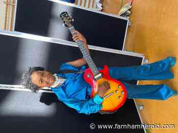 Schoolboy walking in Bjorn's shoes... - Farnham Herald