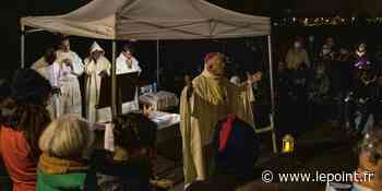 L'évèque d'Arras célèbre une messe de Noël au côté des migrants de Calais - Le Point