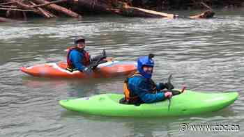 Kayakers deliver supplies to farm cut off by floods in Chilliwack, B.C.