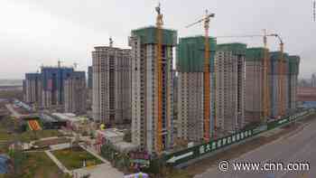 World's most indebted property developer reports progress completing homes