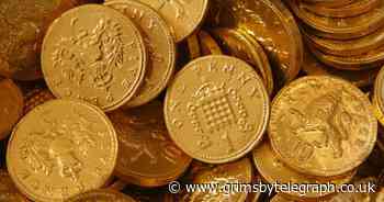 Staffie's 'miracle' surgery after eating six bags of Christmas chocolate coins - Grimsby Live