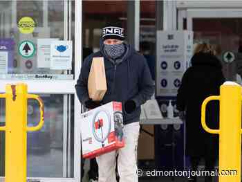 Edmonton Boxing Day shoppers show up despite Omicron variant, freezing cold - Edmonton Journal