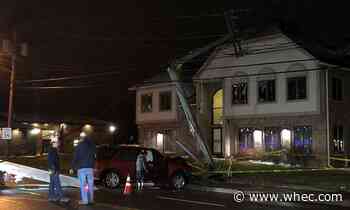 Police: Crash sends car into pole
