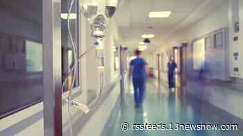 Hospitals feel impact of latest COVID surge, fueled by omicron variant