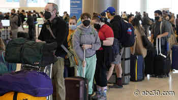 Airlines cancel more than 900 more domestic flights Tuesday amid COVID-fueled holiday travel chaos