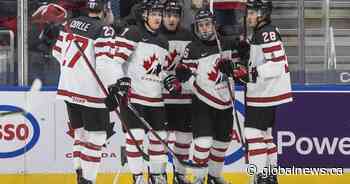 Connor Bedard scores 4 goals to enter record books as Canada wins 11-2 over Austria at world juniors