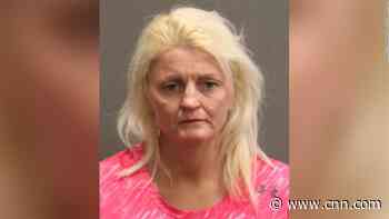 Woman charged after alleged assault and running to cabin door on Spirit flight