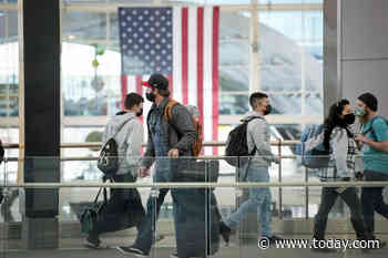 Omicron, weather cause travel chaos as thousands of flights canceled