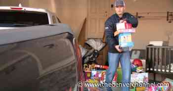 Aurora firefighter gears up to deliver Christmas joy for family who lost everything to house fire - The Denver Channel