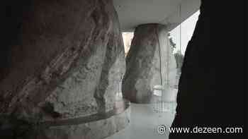 BLUE Architecture Studio erects rocky columns inside Zolaism cafe - Dezeen