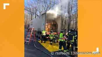 Road back open after tractor-trailer catches fire in Suffolk