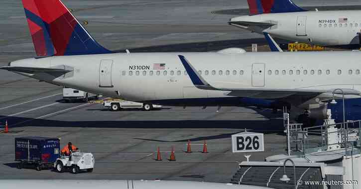 Delta, Alaska cancel hundreds of flights due to bad weather, Omicron cases - Reuters