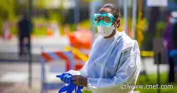 Daily US COVID cases hit record high, as omicron, delta present 'twin threats'     - CNET