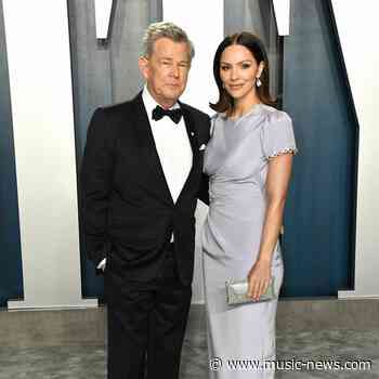 Katharine McPhee defends husband David Foster over bikini photo caption