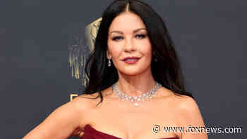 Catherine Zeta-Jones stuns in black bikini: 'Sun's out'