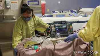 Omicron spread puts Alberta at critical point in fight against COVID-19, experts say