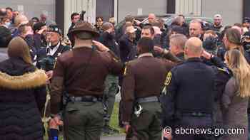 2 police officers shot while responding to call at hotel