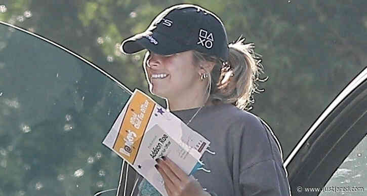 Addison Rae Pairs Baggy T-Shirt with Rain Boots During Day Out in Sunny Beverly Hills