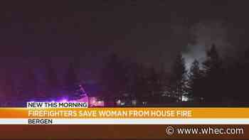 Woman saved from house fire in Bergen