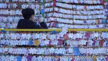 Omicron crashes global New Year party - Gloucester Advocate