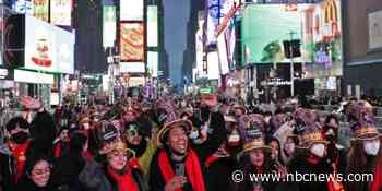 The world rings in 2022 as omicron variant dashes NYE plans