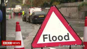 North West flooding: Firefighters rescue people stranded in vehicles
