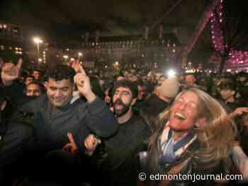 Omicron dampens global New Year celebrations, fewer watch ball drop in New York's Times Square