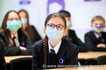 Masks are returning to classrooms as Omicron cases surge